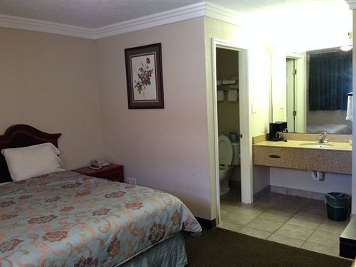 Deluxe Inn Motel Лейк Чарльз Экстерьер фото